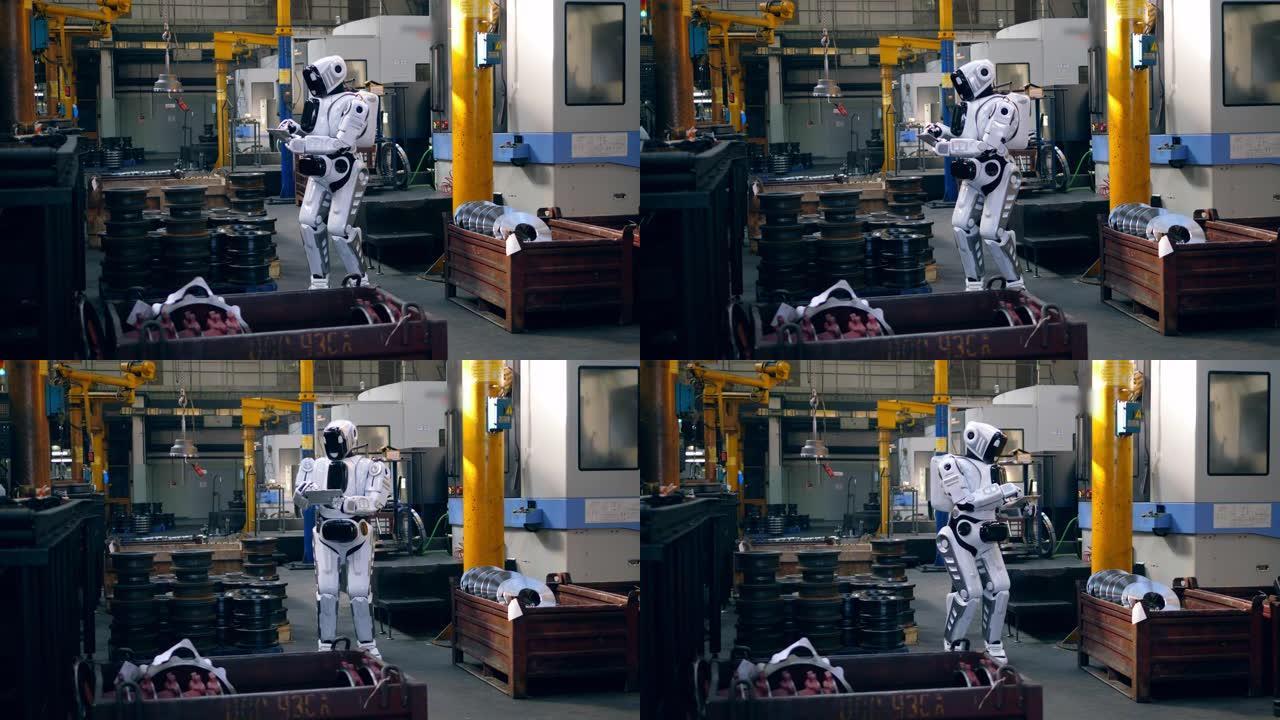带有机器人操作平板电脑的工厂