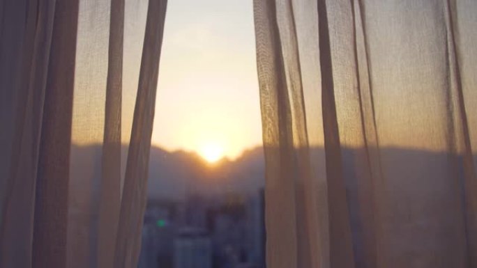 日落时的窗帘窗黄昏夕阳落日