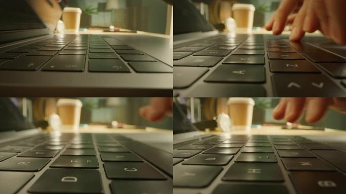 特写微距拍摄: 人打开笔记本电脑，开始打字。专注于手和钥匙。背景晴天