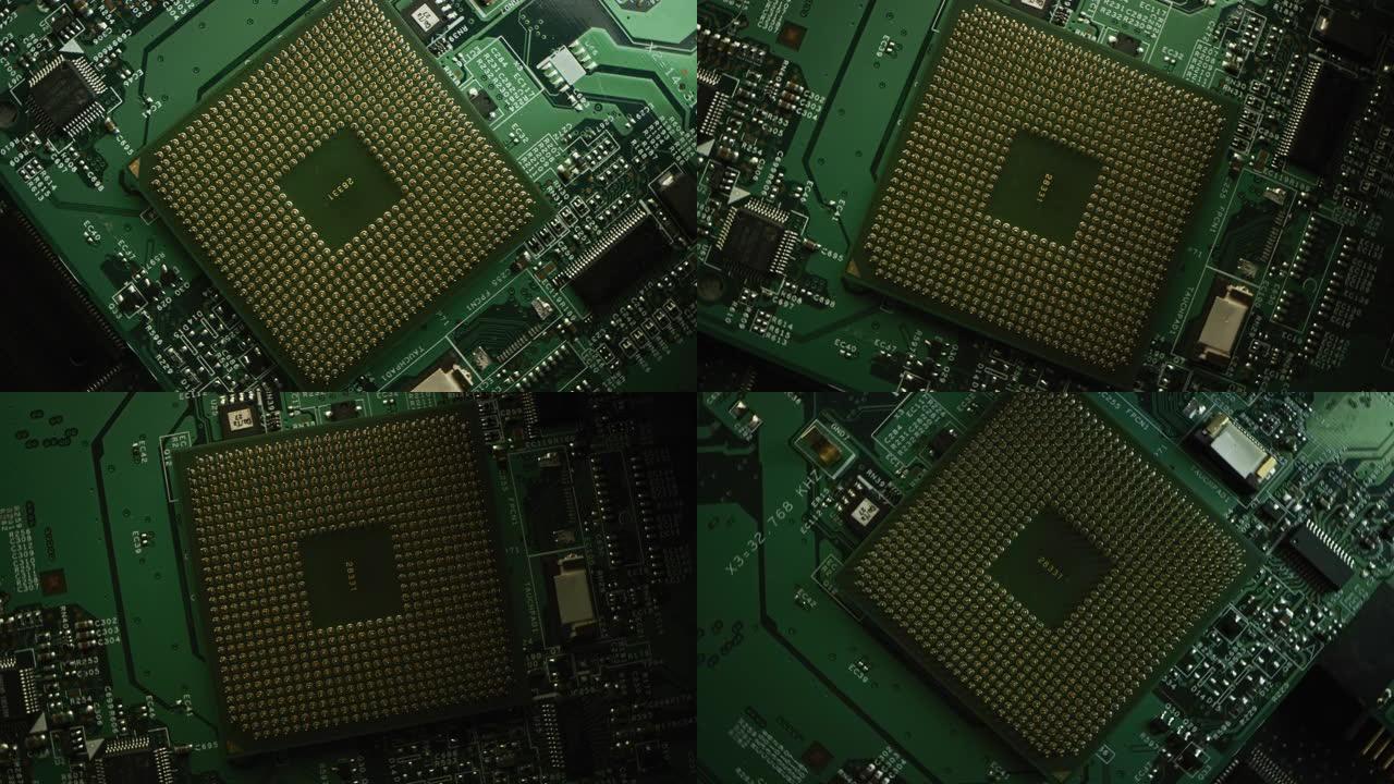 电脑主板，关注CPU处理器插座。印刷电路板: 电子设备内部，超级计算机的部件。俯视图跟踪旋转运动的宏