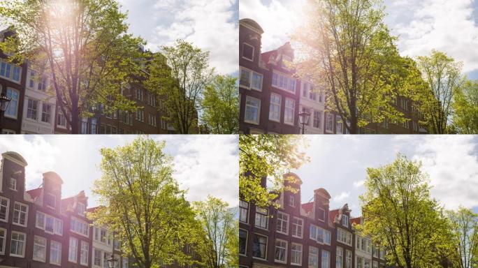在美丽的晴天探索阿姆斯特丹市，欣赏传统的运河房屋