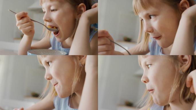 厨房早餐: 可爱的小女孩吃健康格兰诺拉麦片和碗外牛奶的肖像。她可爱的小女孩在吃早餐。在后台，有爱心的
