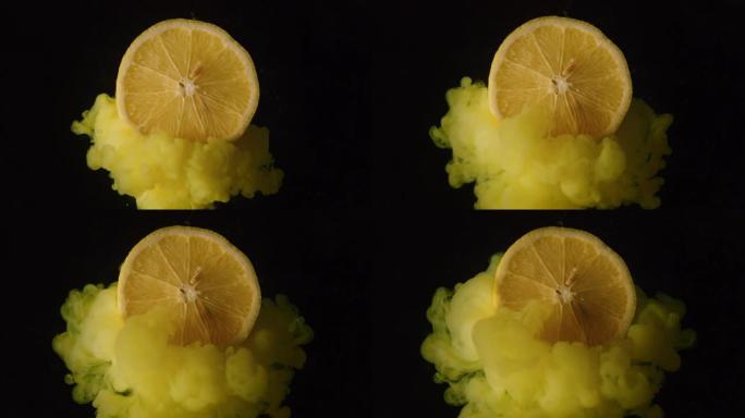 黑色背景上的柠檬在空气中油炸的颜色爆炸效果。