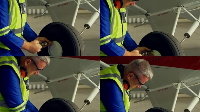 工程师修理飞机4k的轮子