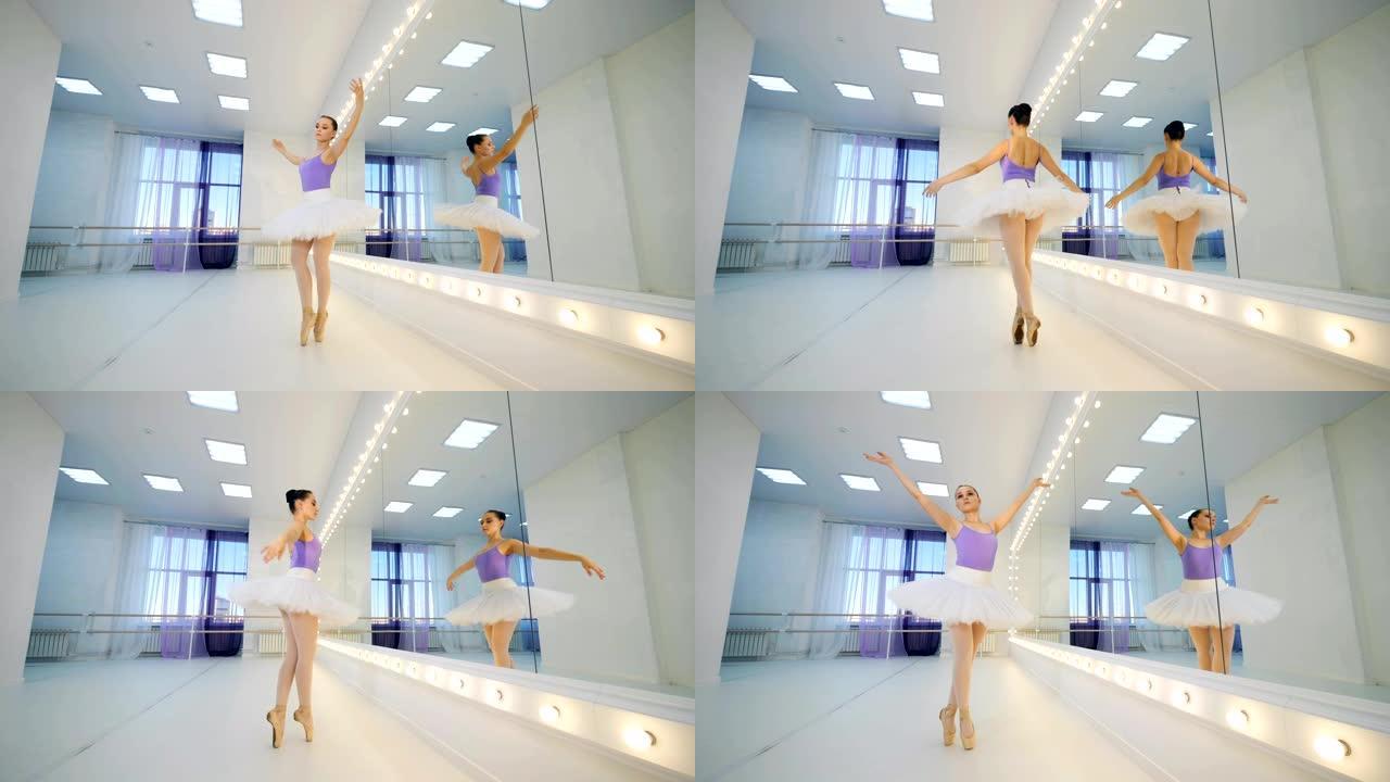 一个在芭蕾舞室训练的女人，旋转，特写镜头。
