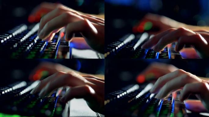 男性手指在侧视图中的键盘上打字