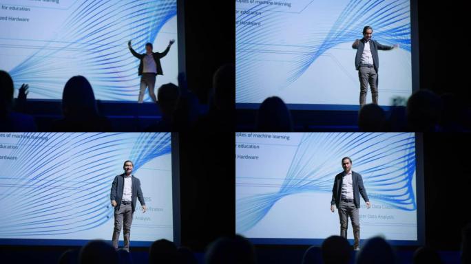 有远见的男性演讲者登上舞台，向观众致意并展示技术产品，在屏幕上显示信息图表，统计动画。现场活动/设备