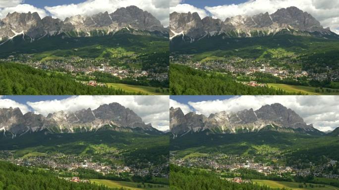 意大利科尔蒂纳丹佩佐。高山绿色景观和白云岩阿尔卑斯山的平移镜头。意大利南蒂罗尔州贝卢诺省。