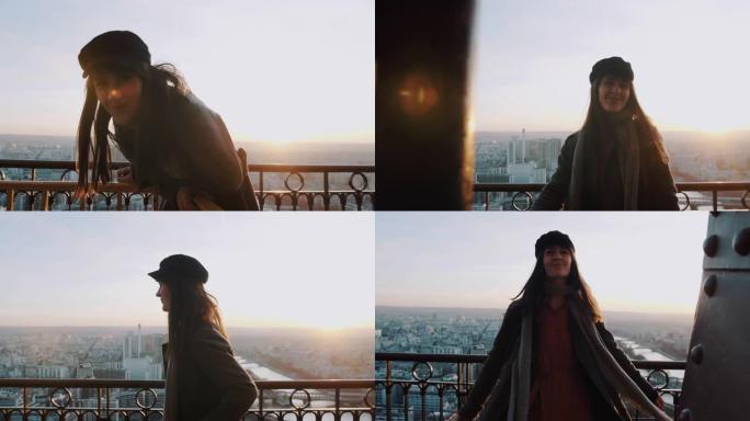 快乐美丽微笑的旅游女人靠在埃菲尔铁塔上的栅栏上，在日落天空背景慢动作上摆姿势。