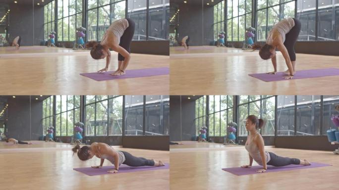 亚洲女子在健身房练习瑜伽