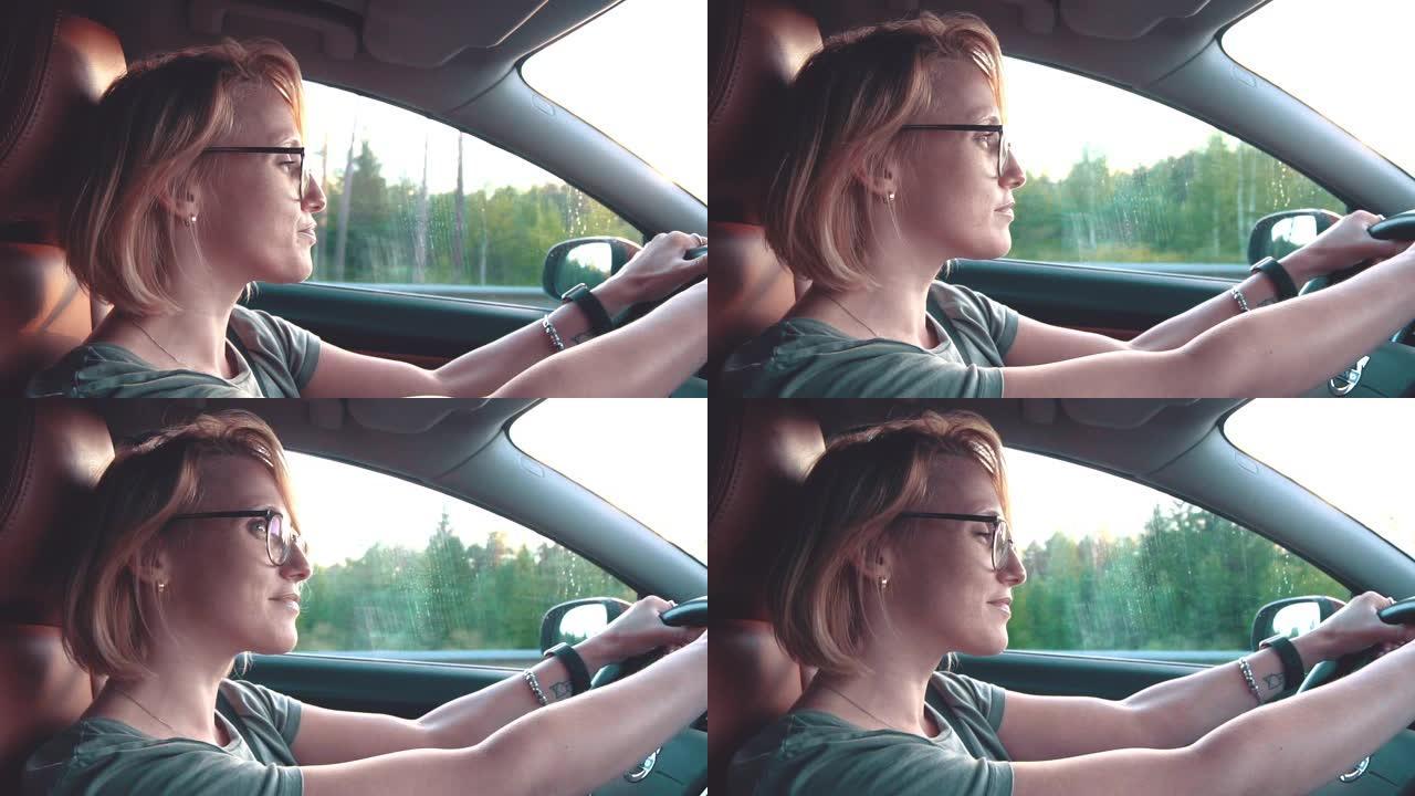 女人在日落时开车实拍视频素材驾车