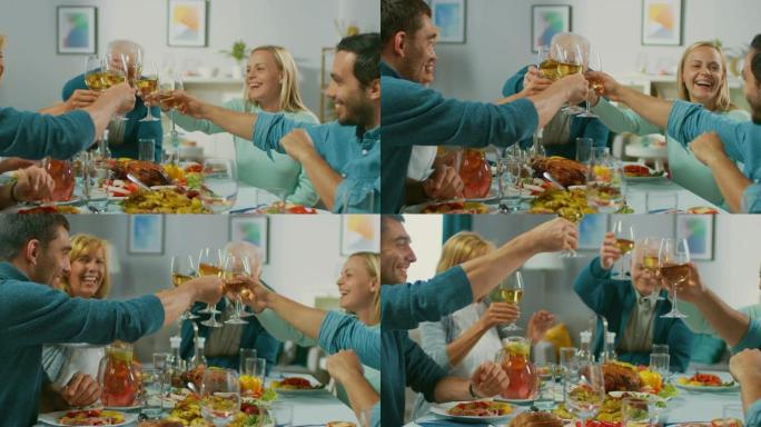 大家庭和朋友在家里庆祝，各种各样的人聚集在餐桌旁，在敬酒中碰杯。人们吃喝玩乐。客厅白天的节日。