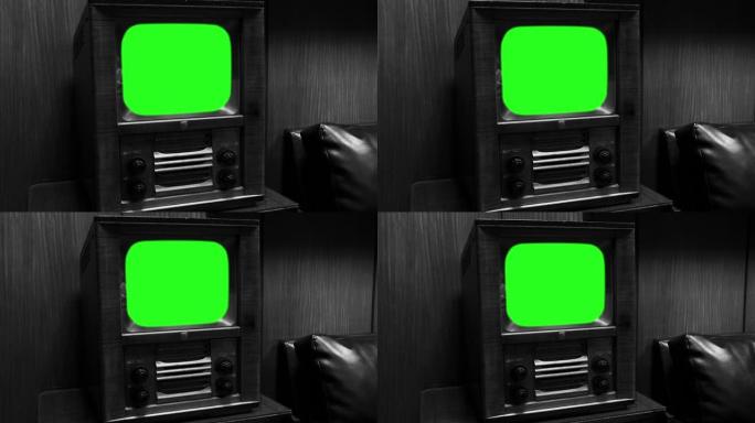带绿屏的50年代旧电视。黑白色调。缩小。