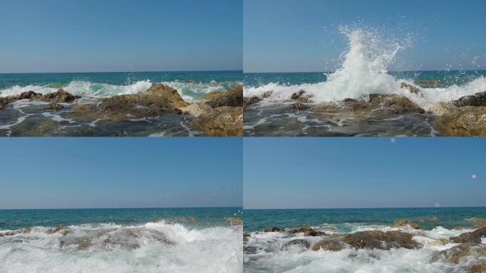 海浪撞击石滩。大海边浪花海岛拍打石头礁石