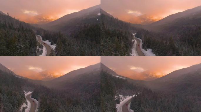 穿越加拿大的空中旅行游客在日出时穿越迷雾森林