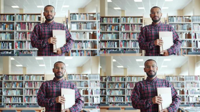 非裔美国学生的肖像在大学图书馆里读书