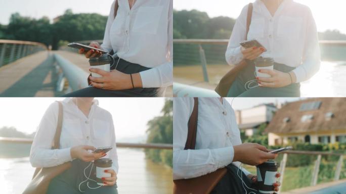 女士无法辨认的女商人使用智能手机，带走咖啡
