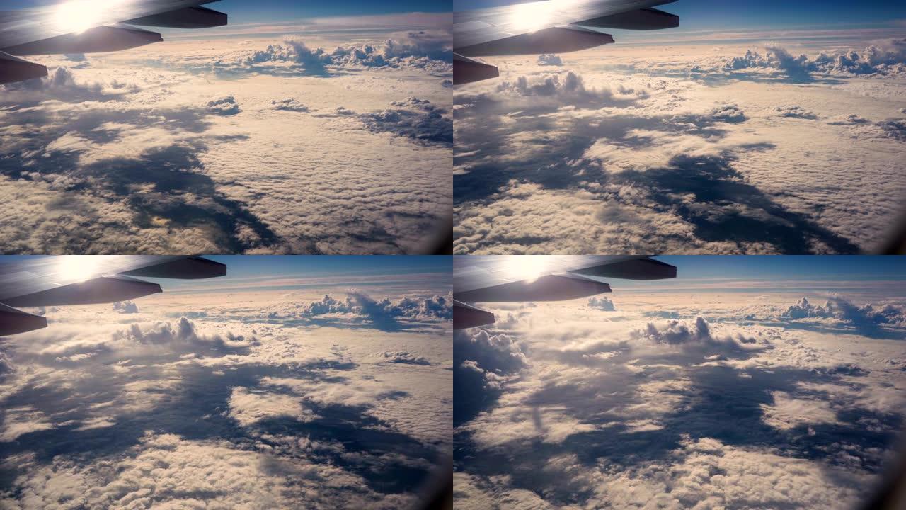 4k跟踪拍摄多云天空的实时日落飞行。