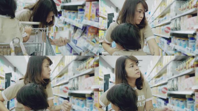 亚洲母子在超市购物