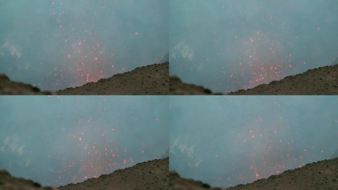 特写: 从活跃的火山口升起的岩浆和烟雾令人惊叹的镜头。