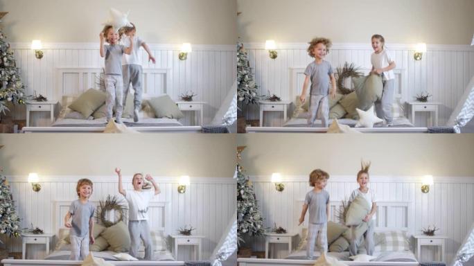 小孩子在圣诞节装饰的房间里跳上床