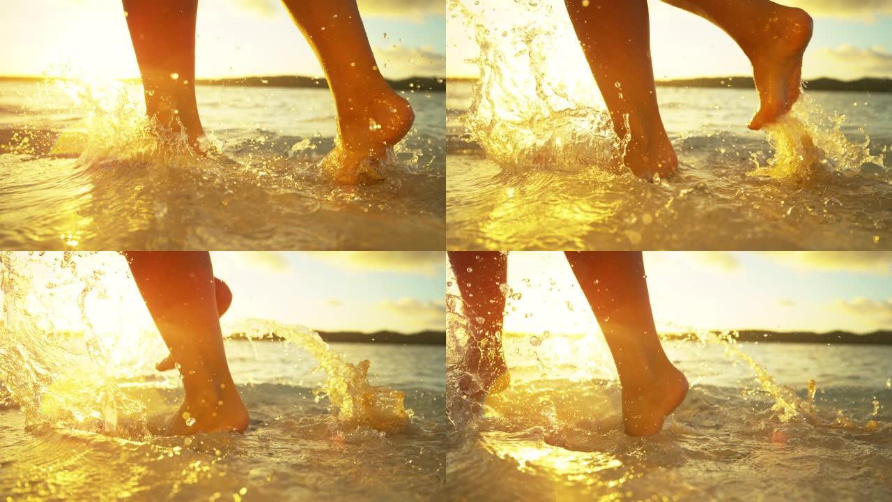 镜头耀斑: 金色的夕阳照耀着在浅海水中行走的赤脚女孩。