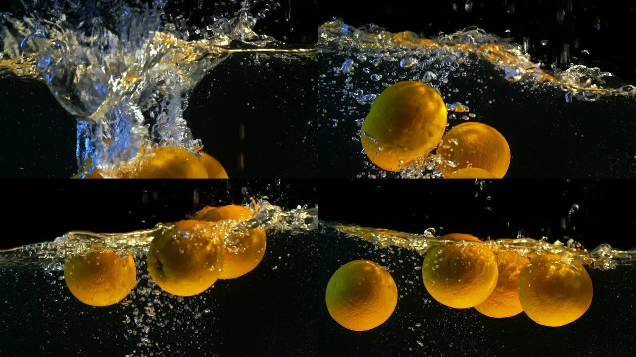 甜橙蘸水慢动作鲜橙清洗入水