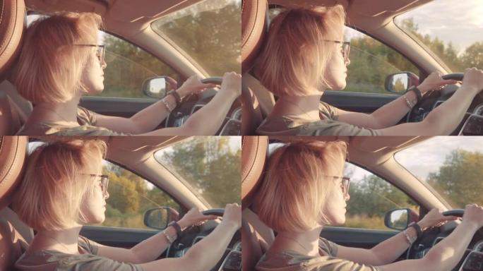 女人在日落时开车