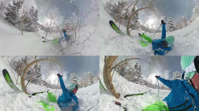 自拍照: 滑雪时滑雪者在深粉雪中坠落的有趣镜头。