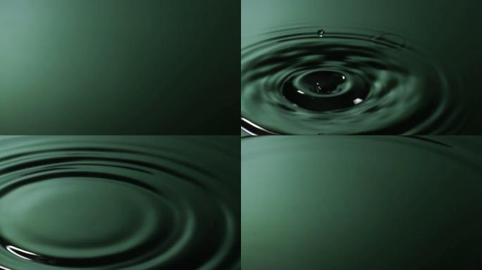 慢动作: 水滴变成绿色的水。