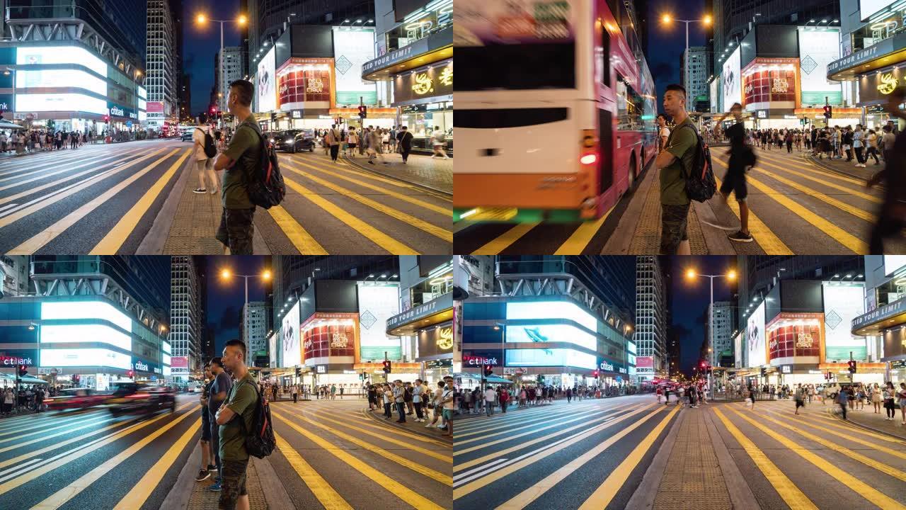 香港旺角人行横道上行人步行和交通车的时间流逝