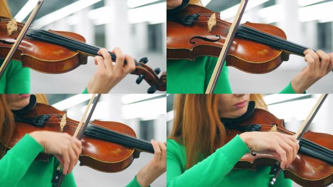 在女性手中演奏小提琴的特写镜头