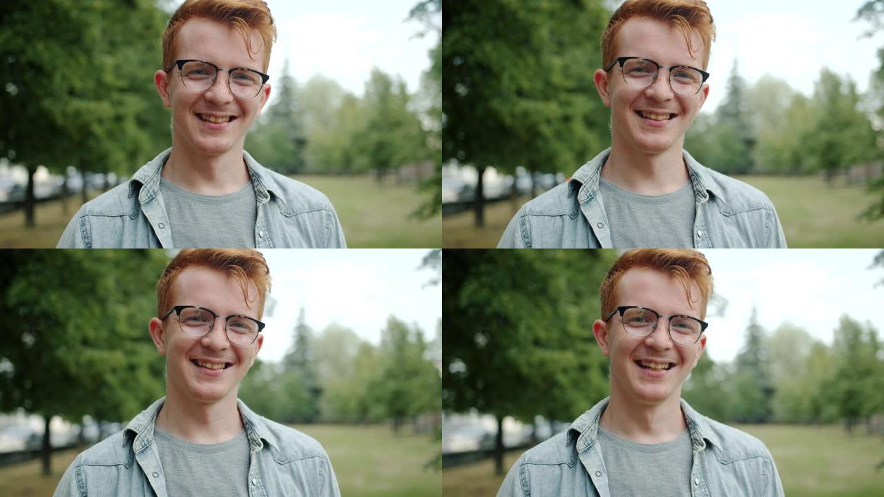 夏天公园里红头发的漂亮年轻人的肖像