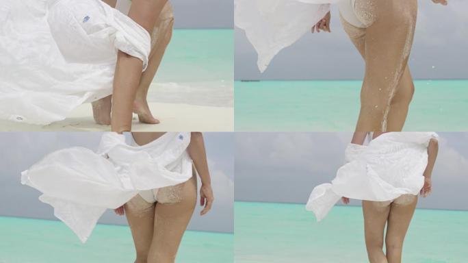 CU妇女在马尔代夫热带白色沙滩上放松