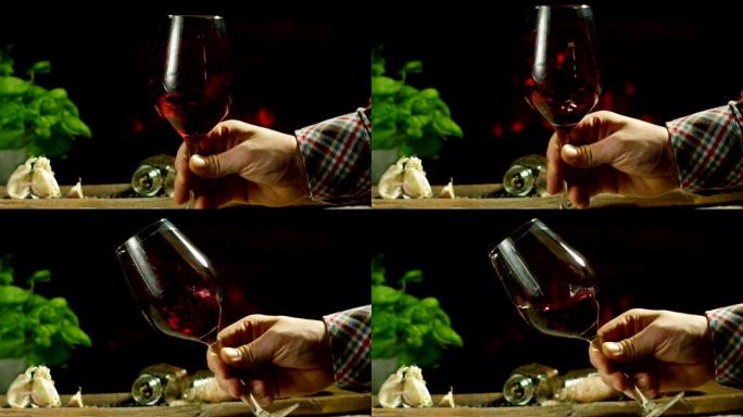葡萄园的侍酒师以慢动作将意大利红酒倒入玻璃杯中