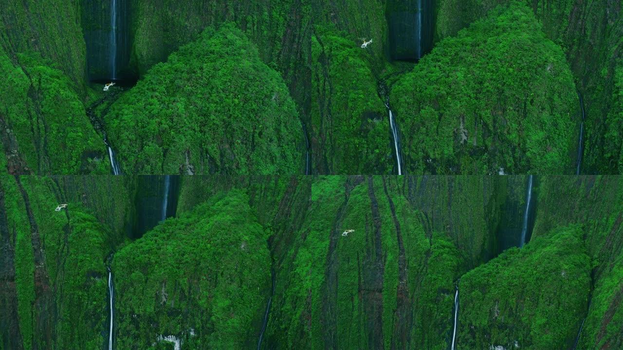 直升机在巨大瀑布的底部盘旋