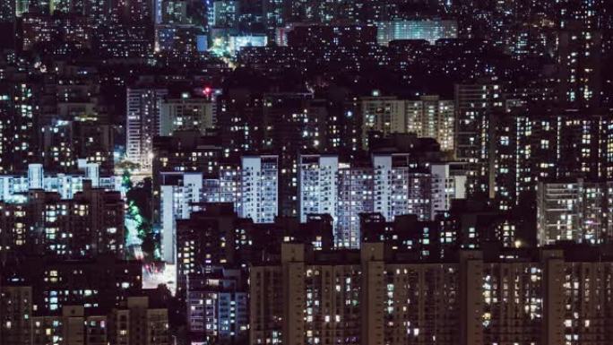 T/L WS HA PAN住宅楼，夜间窗户闪烁/中国北京