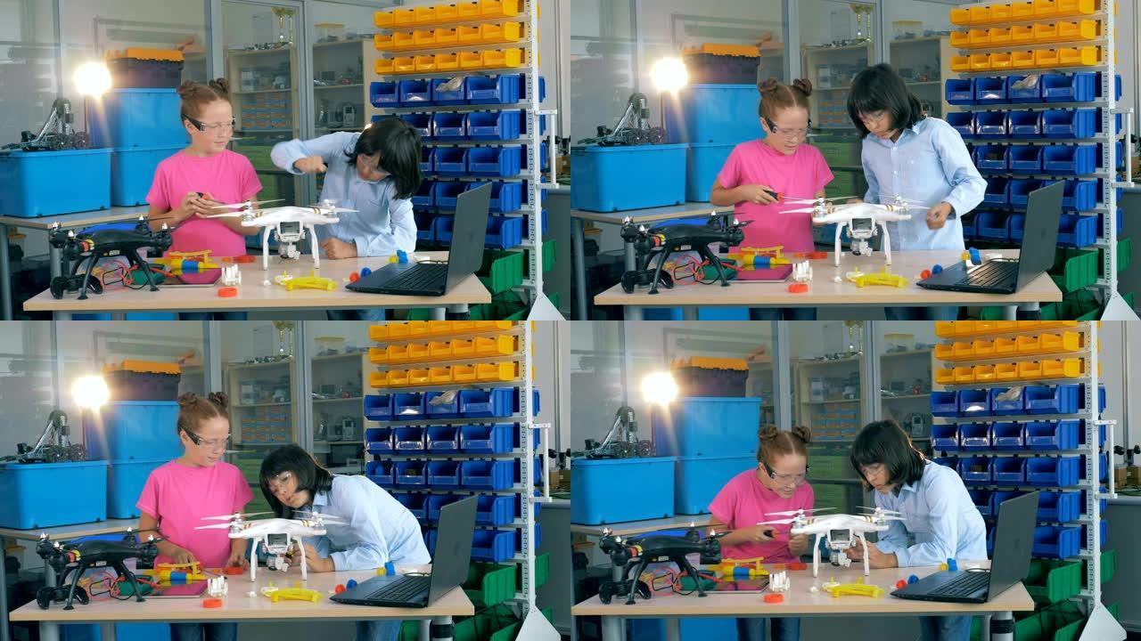 孩子们在技术课上组装飞机。