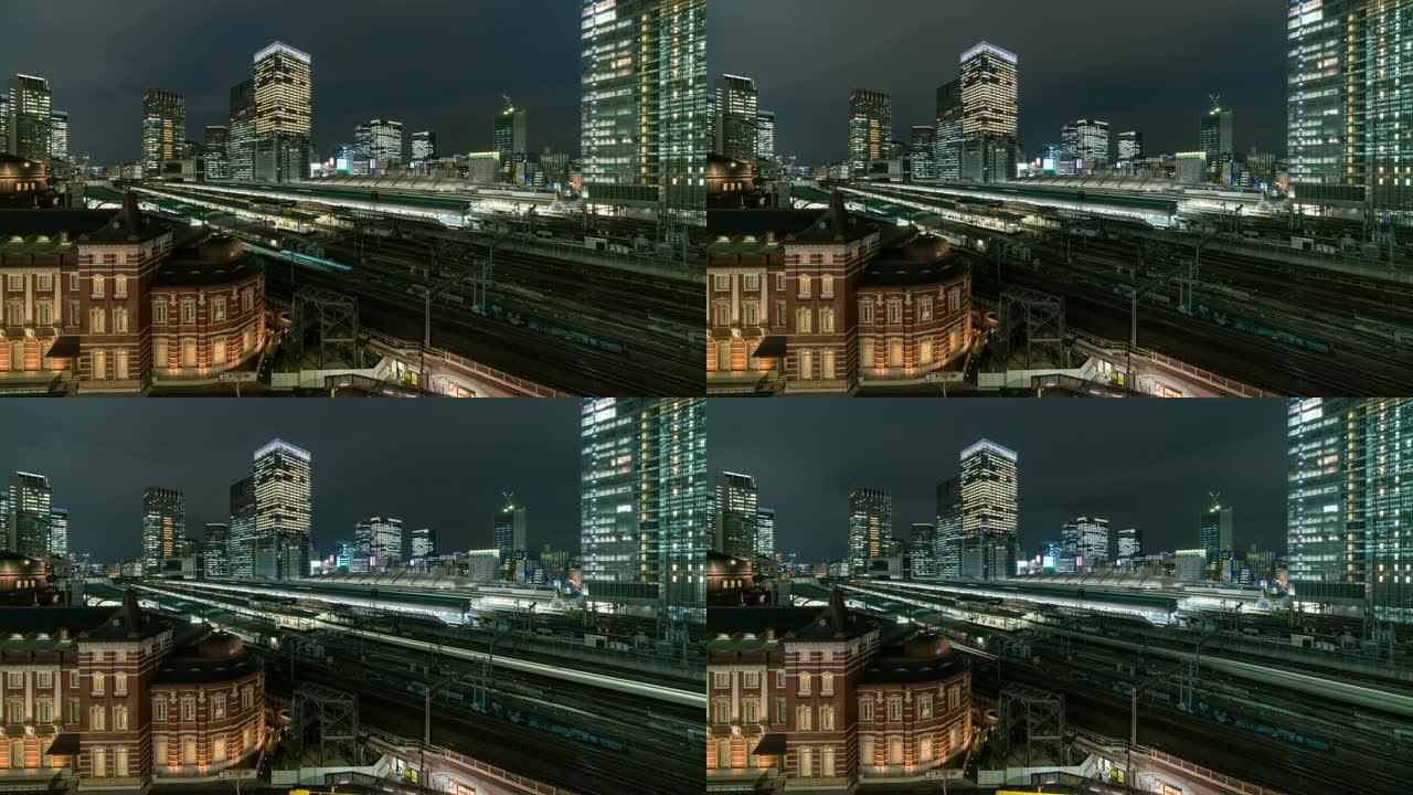 日本东京市黄昏时分，东京站和丸之内的4k延时鸟瞰图列车运输，具有各种建筑城市景观和交通铁路。交通概念