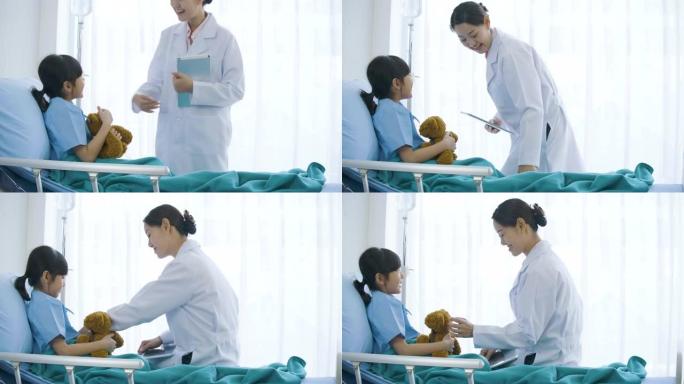 小女孩在重症监护室和女医生说话。