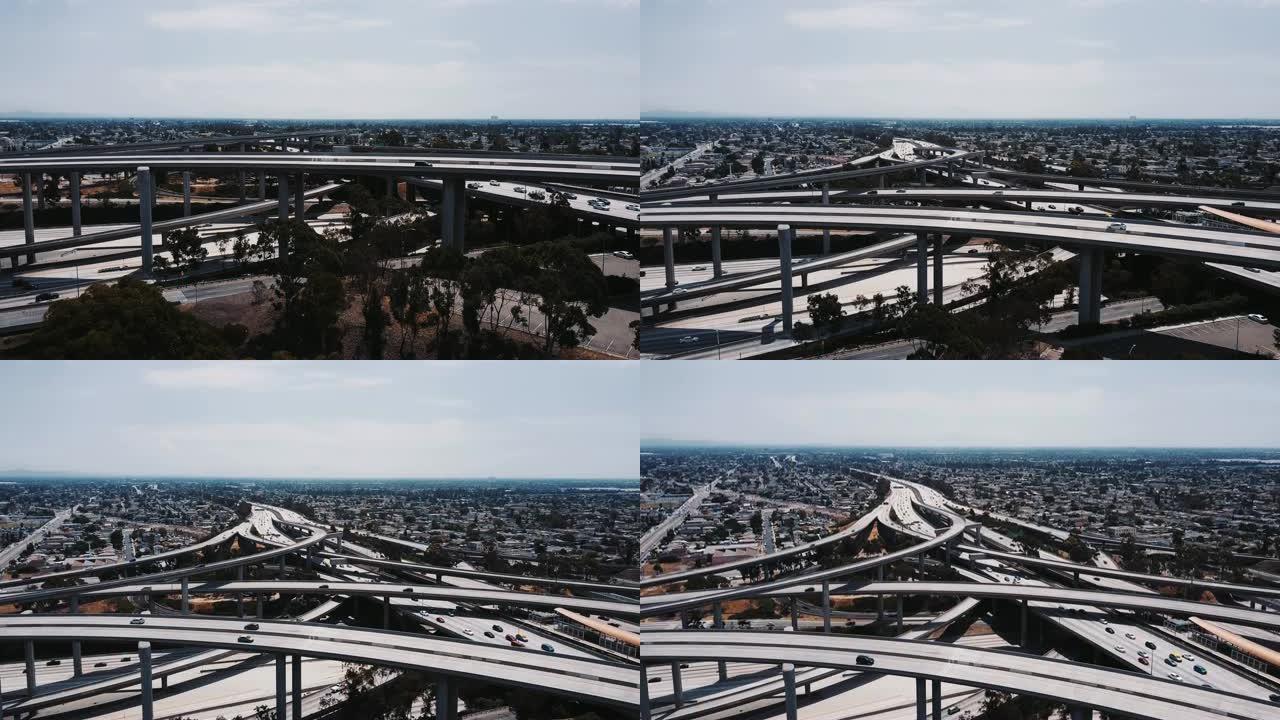 无人机崛起，揭示了洛杉矶与大型住宅区的大型复杂法官普雷格森高速公路交叉口。