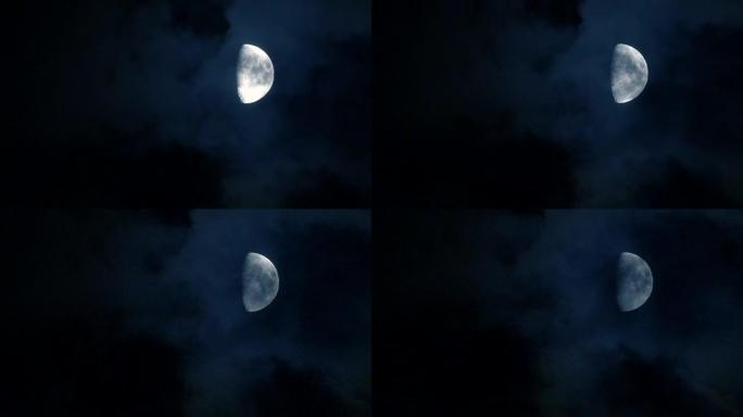 夜晚有云的月亮夜黑上升明月光月球月圆夜