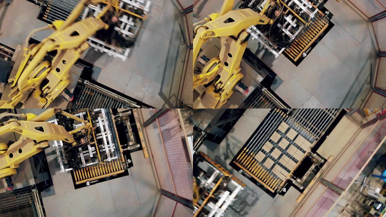 在工厂工作的机械机械臂的俯视图。工业革命4.0