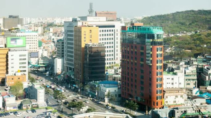 延时: 韩国首尔明洞市中心摩天大楼天际线的鸟瞰图