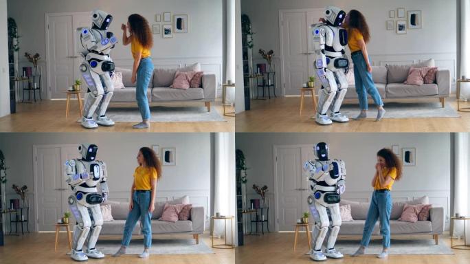 一个半机械人在被一位女士拥抱后跳舞