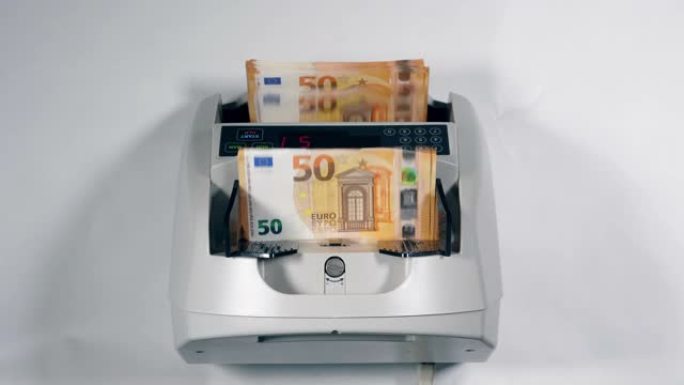 现代机制正在计算欧元钞票