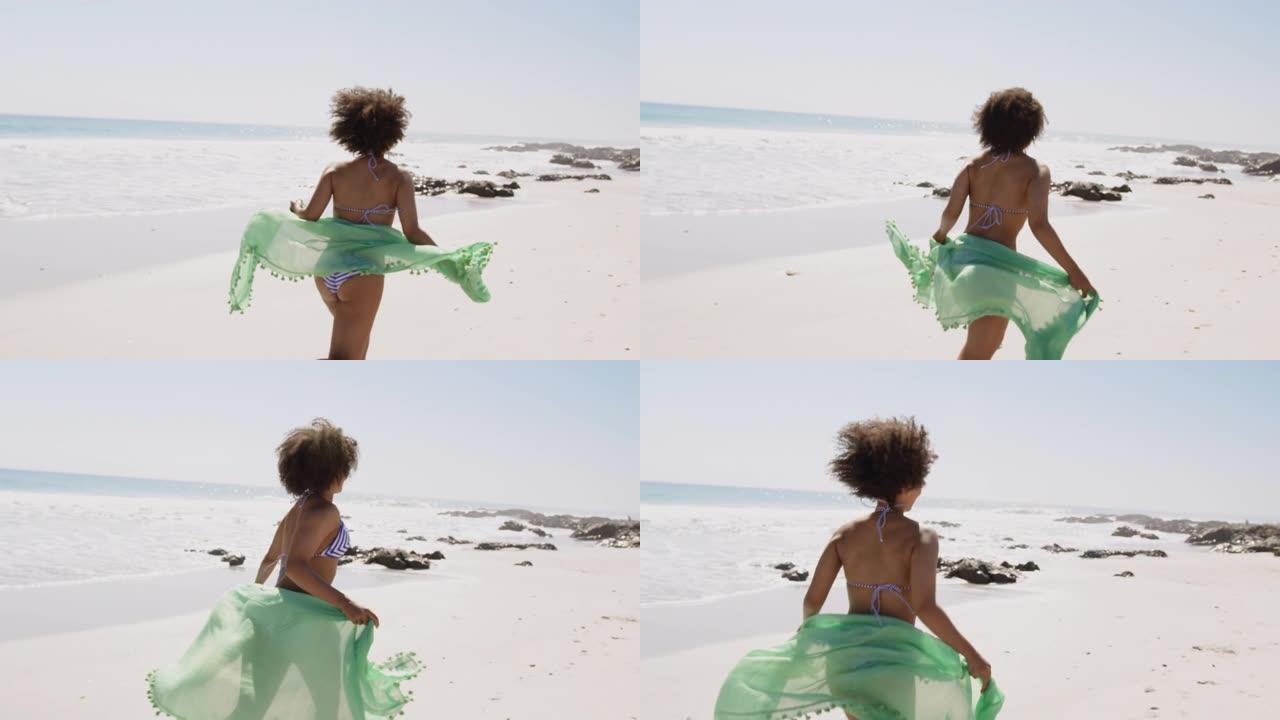 在海边奔跑的年轻女子4k