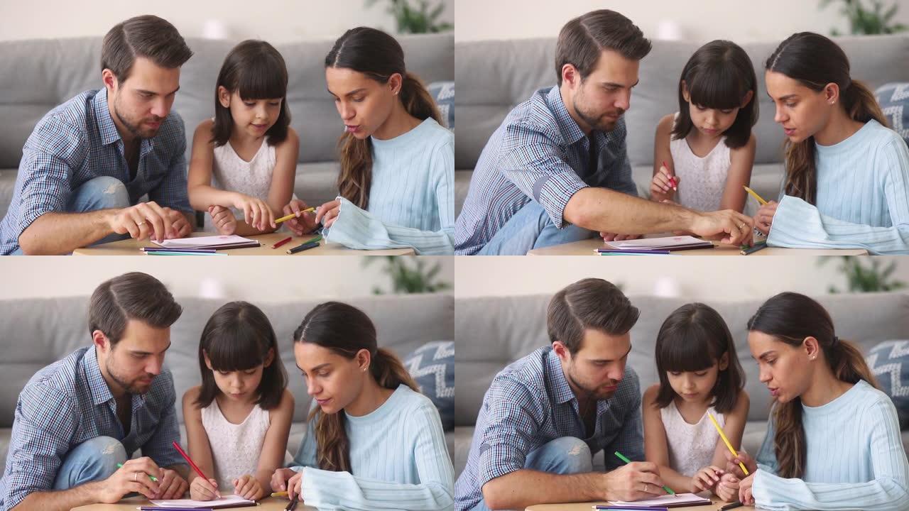 父母教孩子女儿用铅笔说话画画
