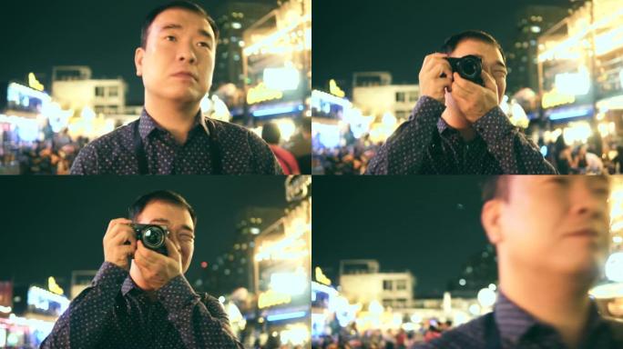 惊喜: 韩国游客在夜生活中拍照