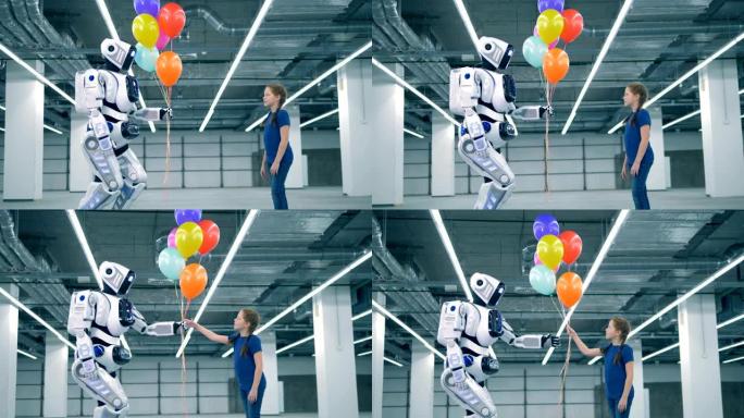 一个机器人给一个女孩彩色气球。未来的概念。